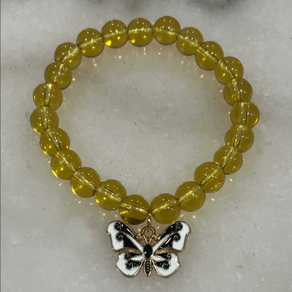 Elegant Yellow Beaded Bracelet with Butterfly Charm